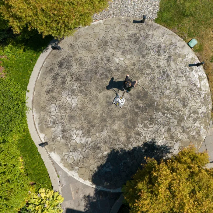 a person standing on a stone path